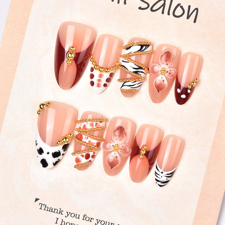Artistic Press-On Nail Art Set with Floral and Gem Embellishments Stornfield