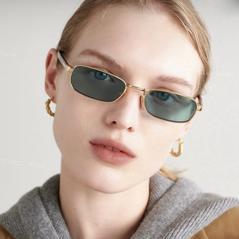 Ladies fashionable sunglasses with stylish metal frame and orange lenses Stornfield