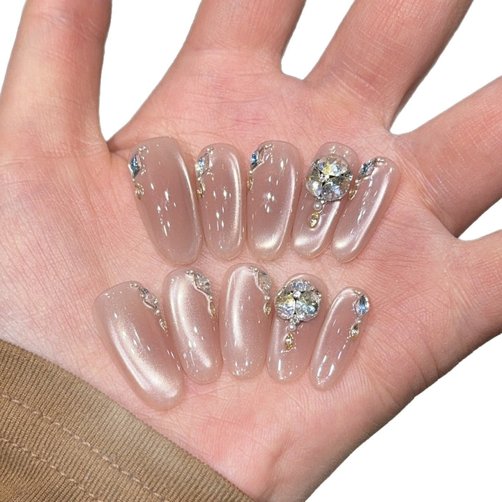 Glamorous artificial nails with rhinestone embellishments Stornfield