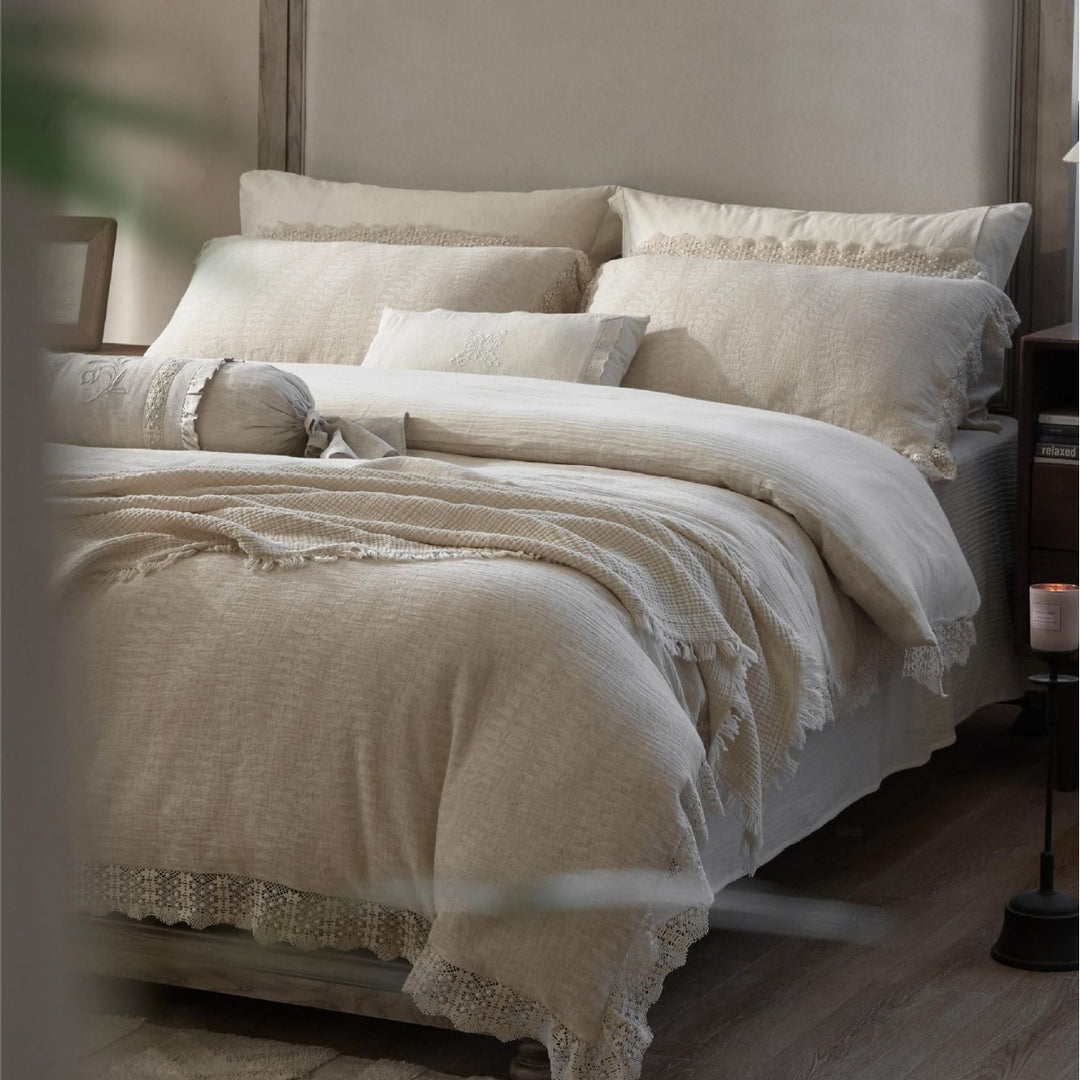 Natural linen bedding set with lace edge and decorative neck roll
