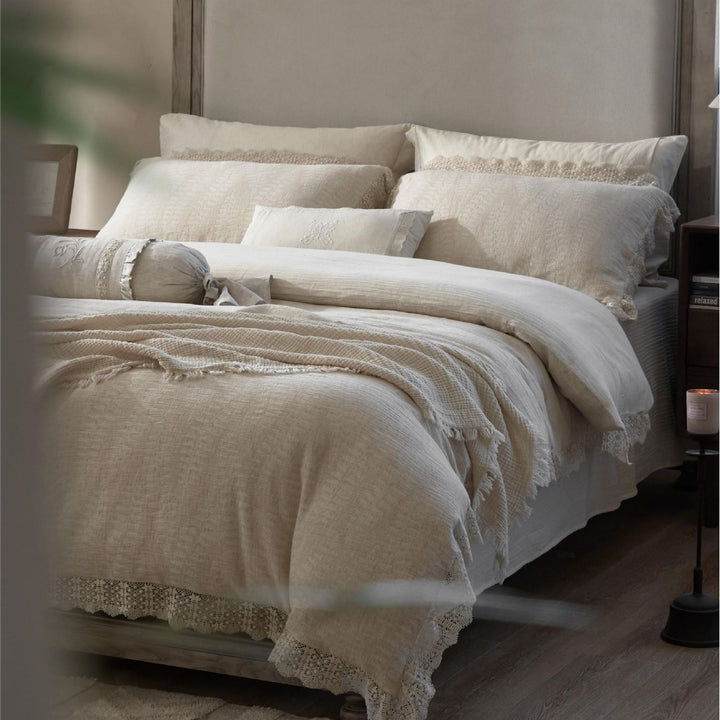 Natural linen bedding set with lace edge and decorative neck roll