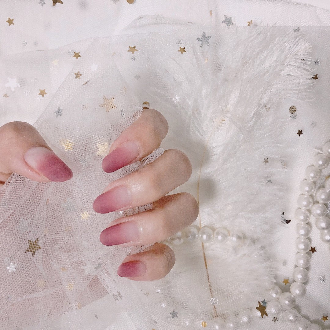 Artful nail extensions with an elegant leaf pattern Stornfield