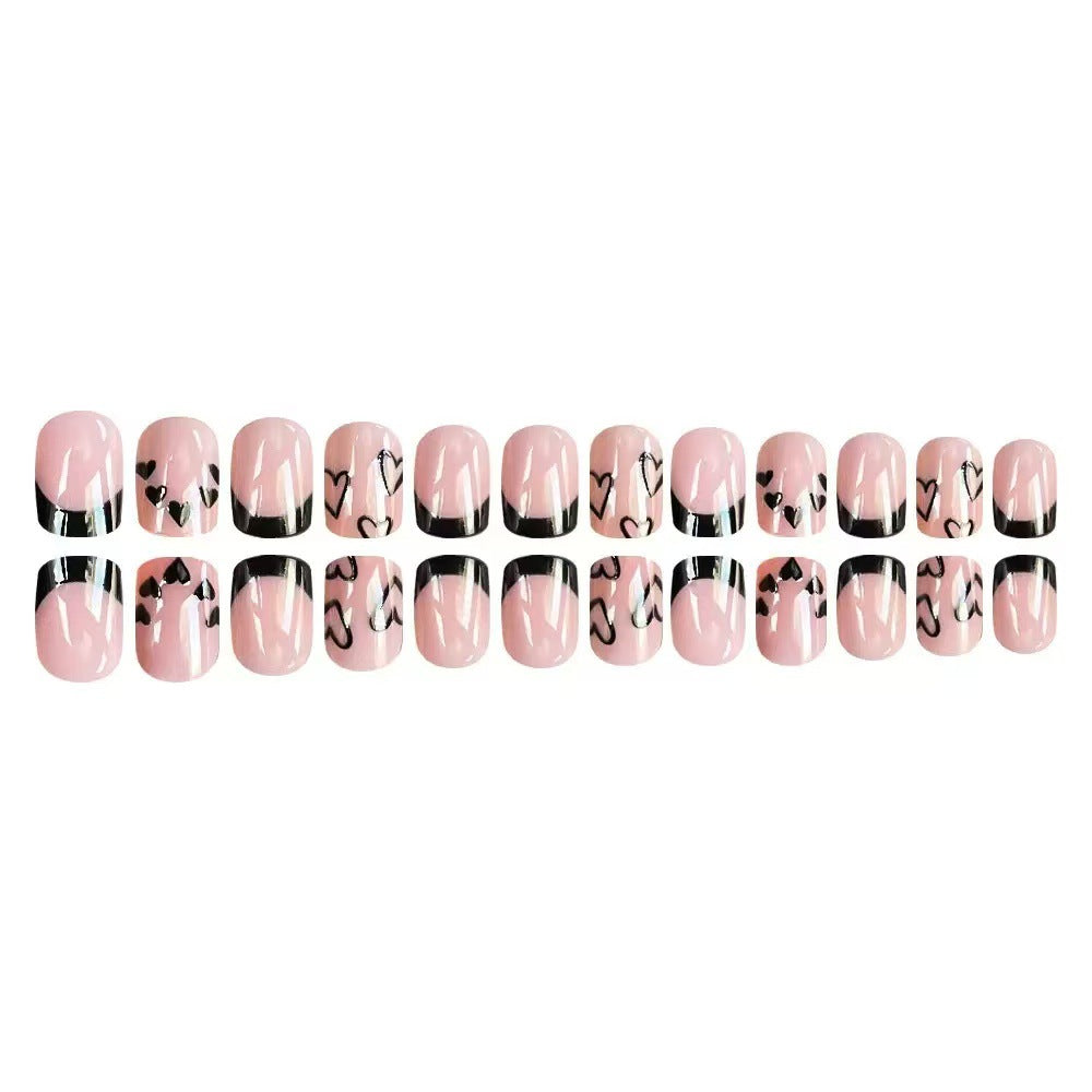 Artificial nail set with creative heart and black-and-white design Stornfield