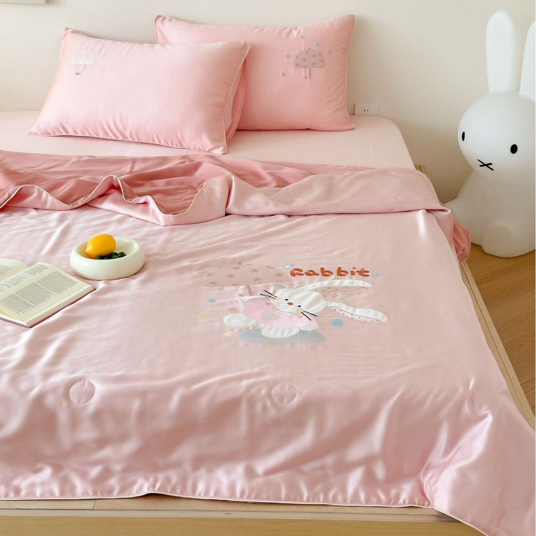 Children's satin bedding set with embroidered bunny moon and silky reversible throw
