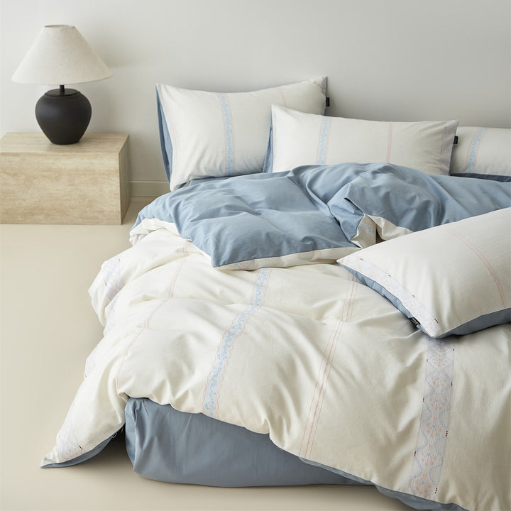 Reversible Cotton Sateen Duvet Cover Set with Decorative Embroidered Stripe and Matching Pillow Shams