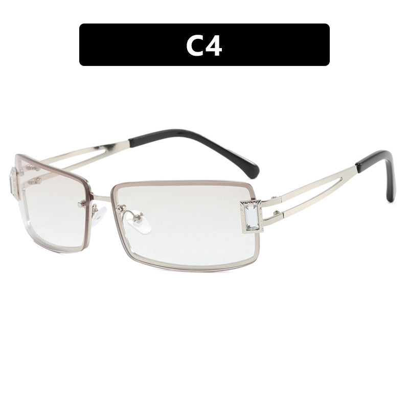 Ladies stylish sunglasses with elegant trapezoidal lenses and filigree metal frame Stornfield
