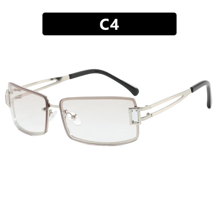 Ladies stylish sunglasses with elegant trapezoidal lenses and filigree metal frame Stornfield