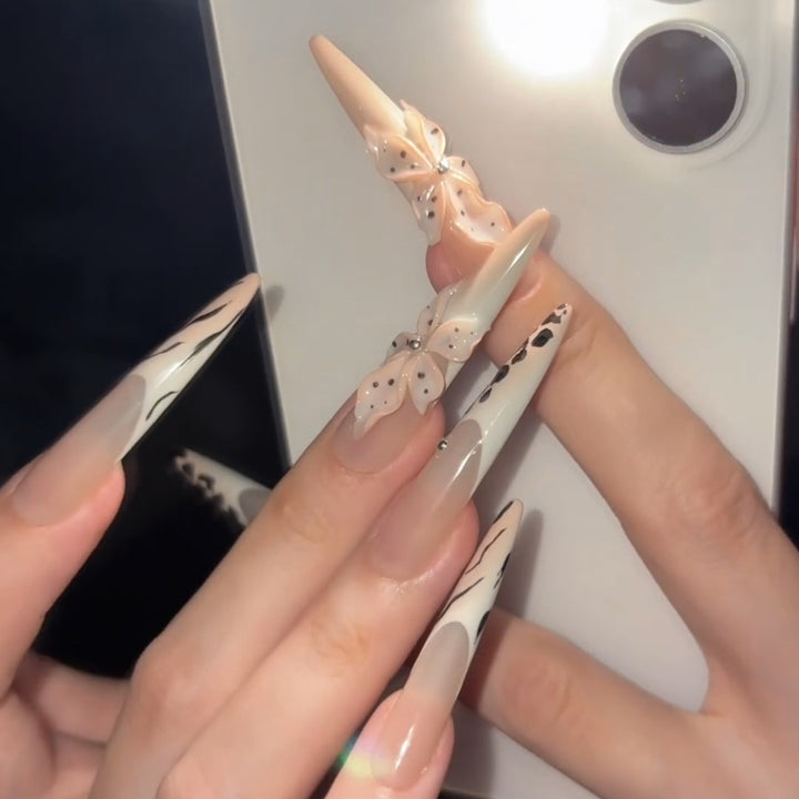 Elegant artificial nails with flower and animal design Stornfield
