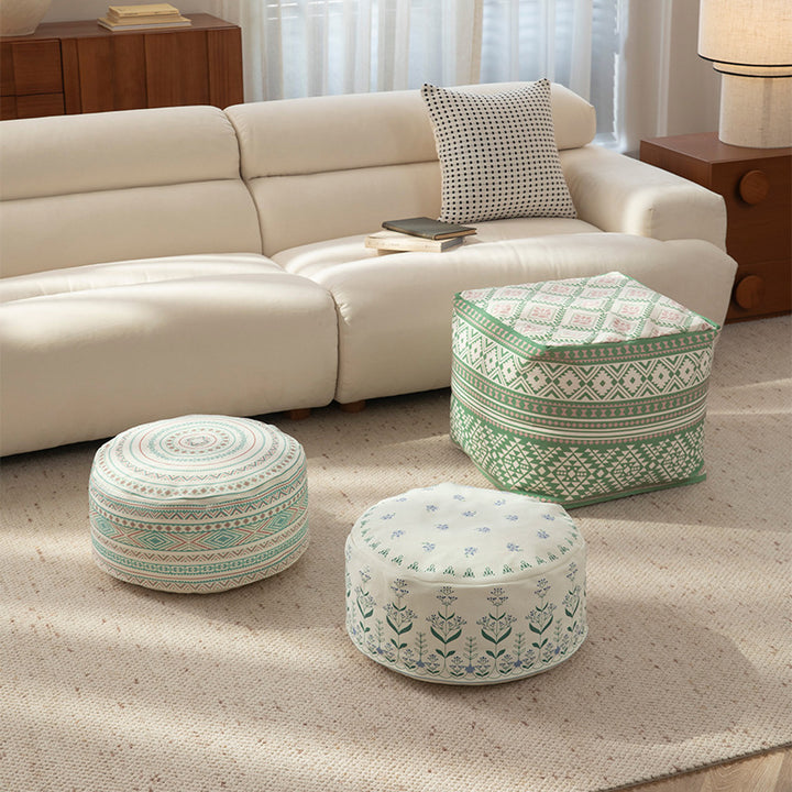 Round floor pouf with ethnic weaving pattern and practical carrying handle Stornfield