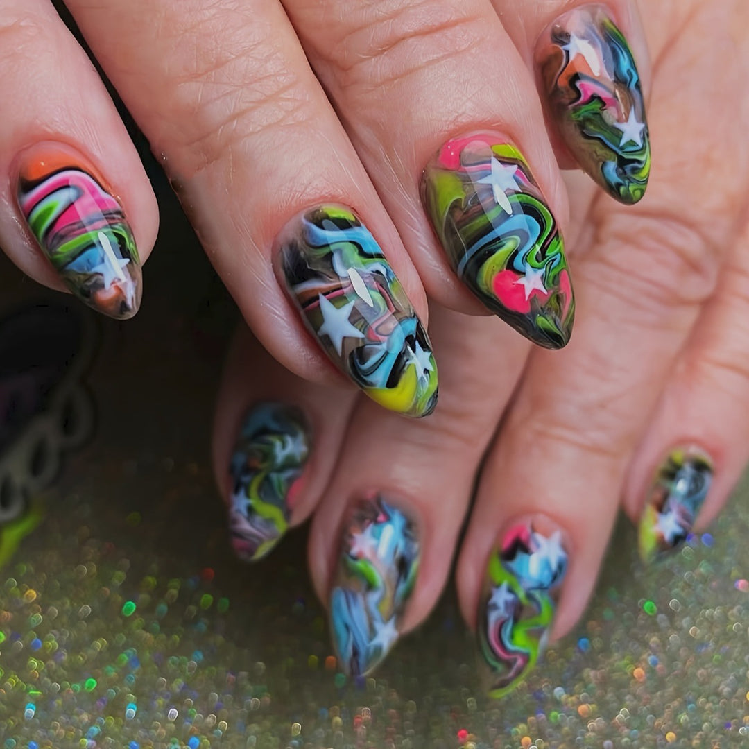 Artificial nails with creative gradient color and star motif Stornfield