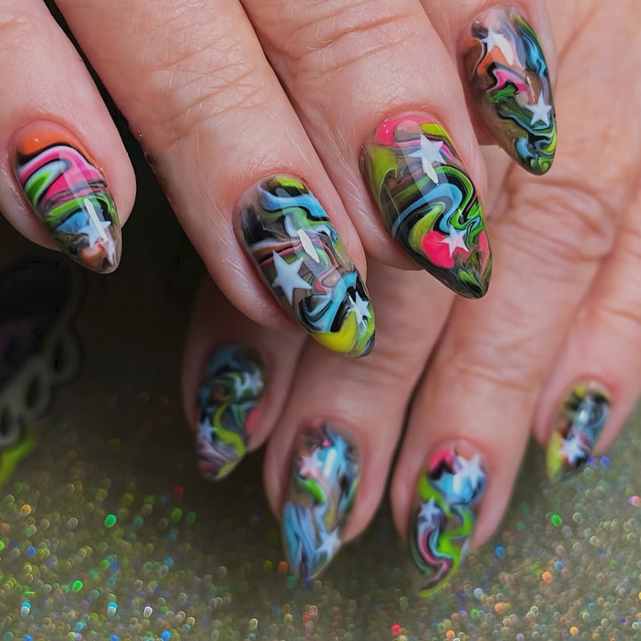 Artificial nails with creative gradient color and star motif Stornfield