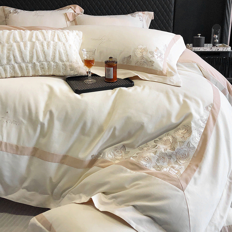 Hotel-style bedding set made of cotton satin with embroidered rose relief and fine border