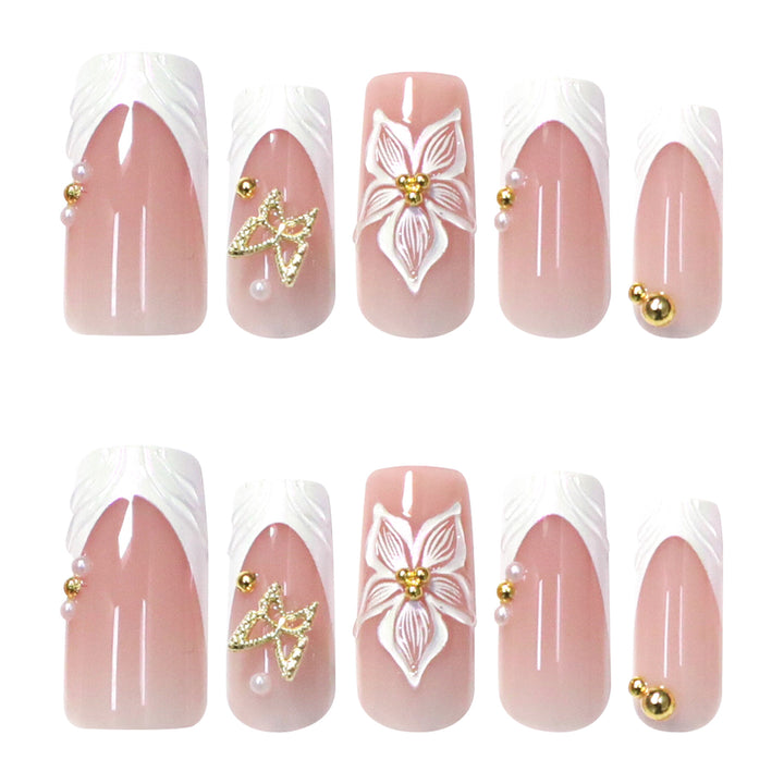 Elegant artificial nails with floral design and gold accents Stornfield