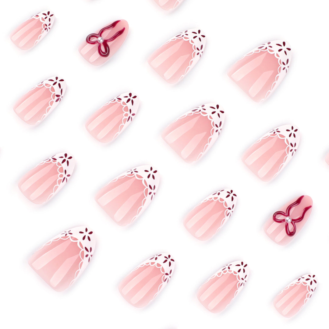 Artful stiletto nails with delicate floral accents Stornfield