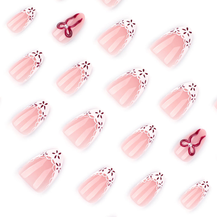 Artful stiletto nails with delicate floral accents Stornfield
