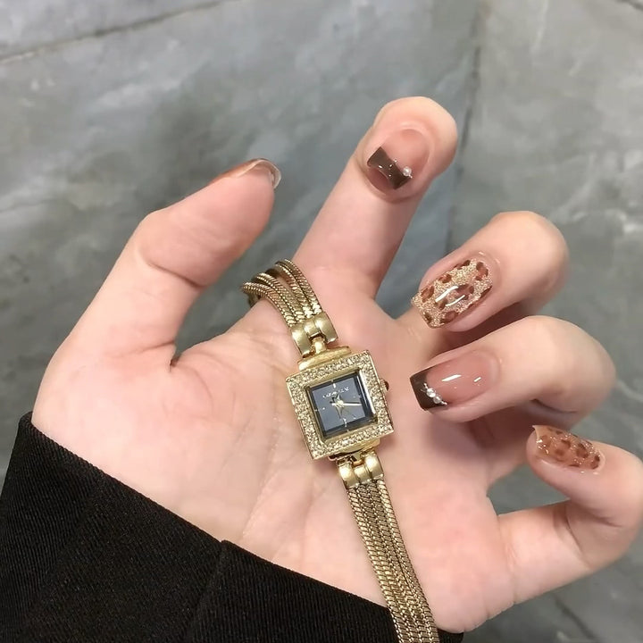 Elegant wristwatch with square dial and luxurious mesh band Stornfield