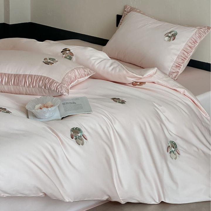 Luxurious cotton satin bedding set with embroidered bunnies