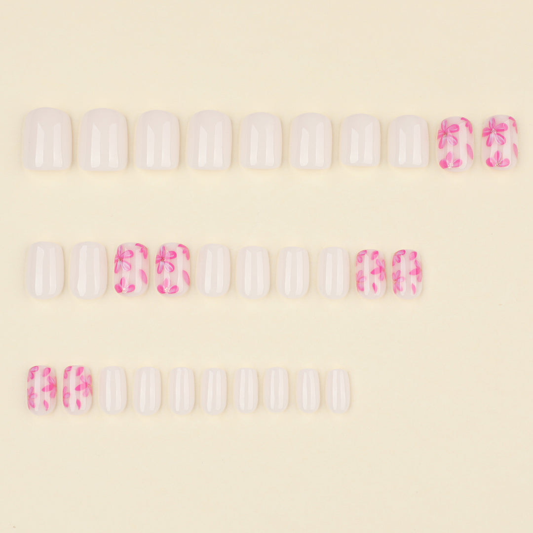 Stylish artificial nail design with floral accents Stornfield
