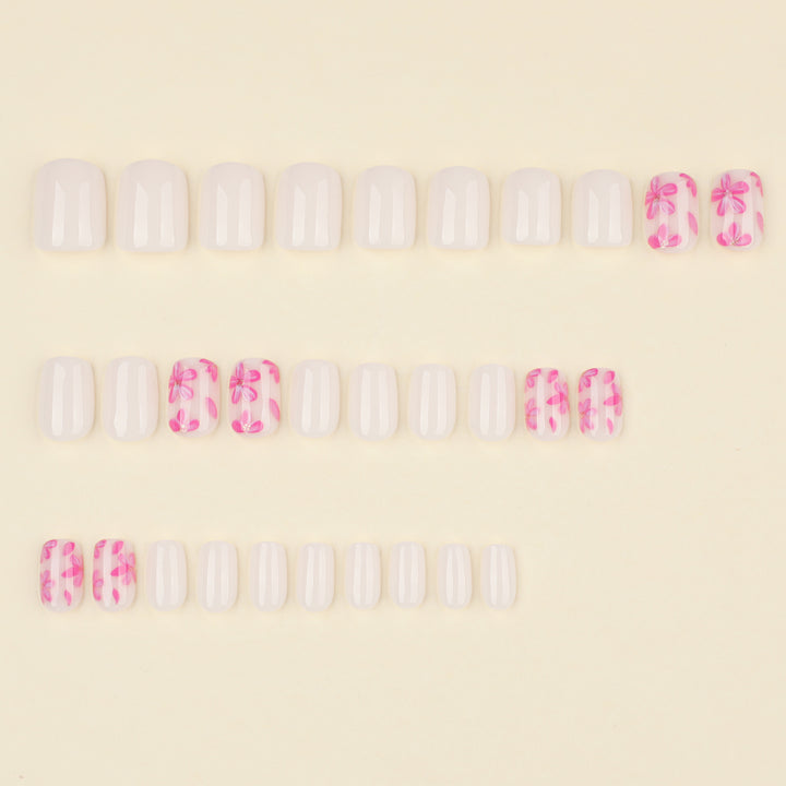 Stylish artificial nail design with floral accents Stornfield