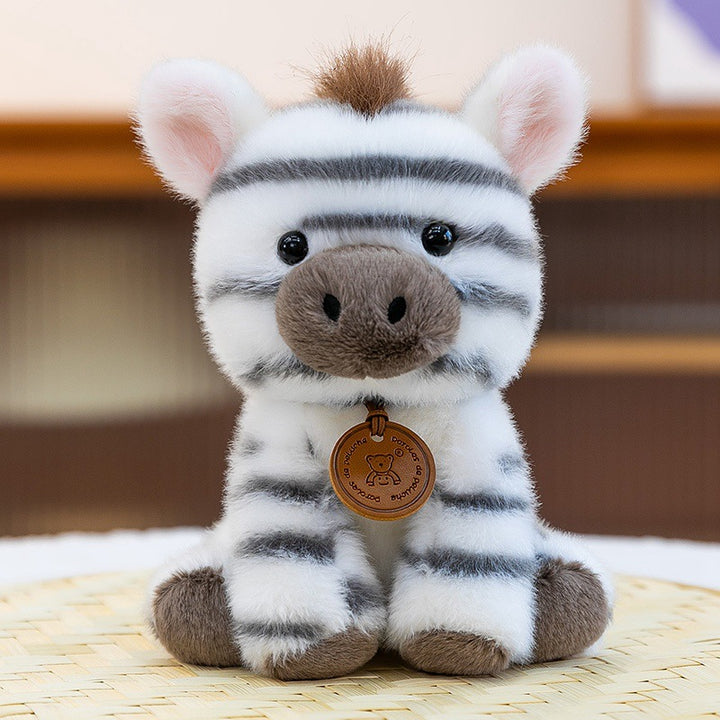 Plush Sitting Lion Cub Collectible with Embroidered Face and Hanging Medallion Stornfield