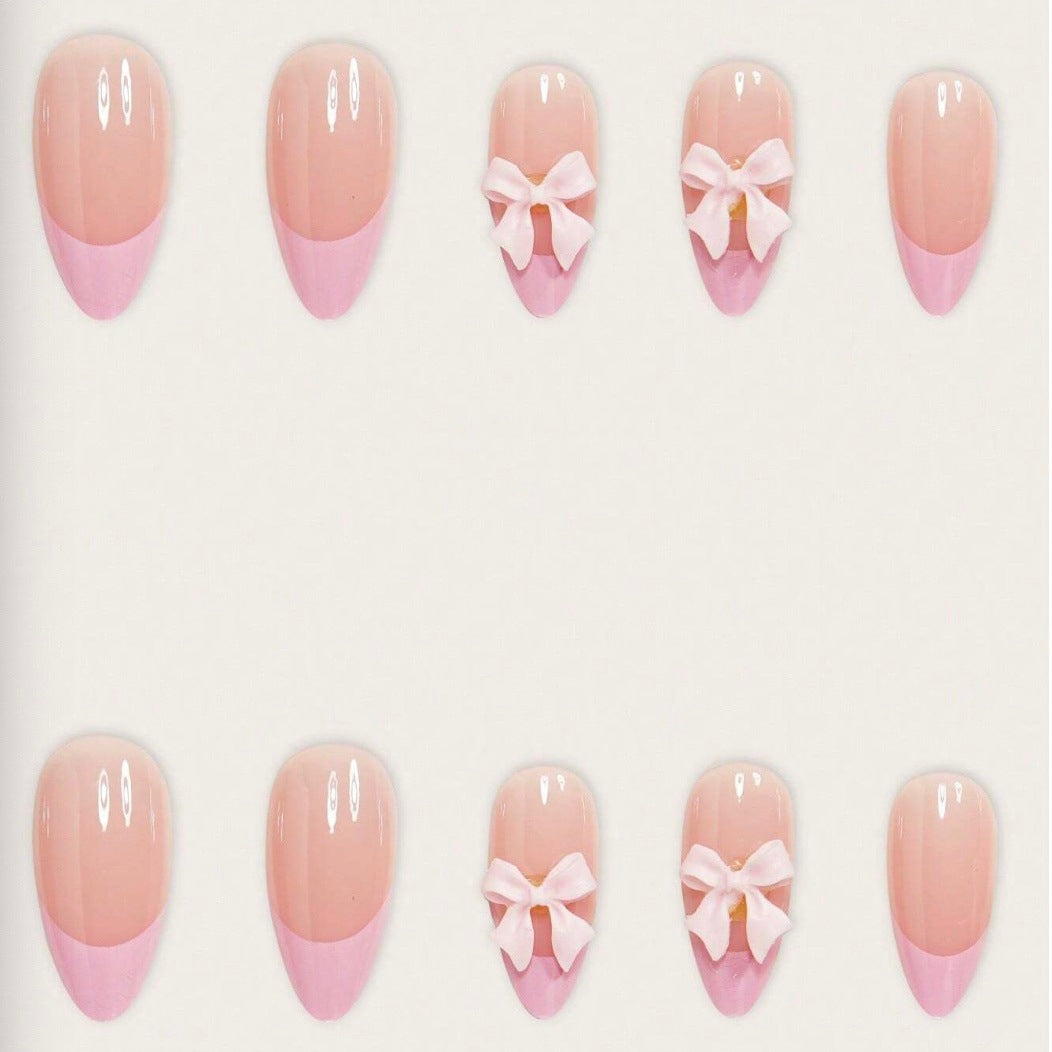 Nail art set with playful ribbons and shiny decorations Stornfield