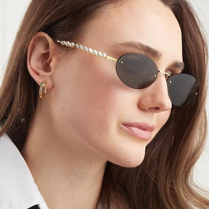Women's stylish oval sunglasses with elegant embellishments Stornfield
