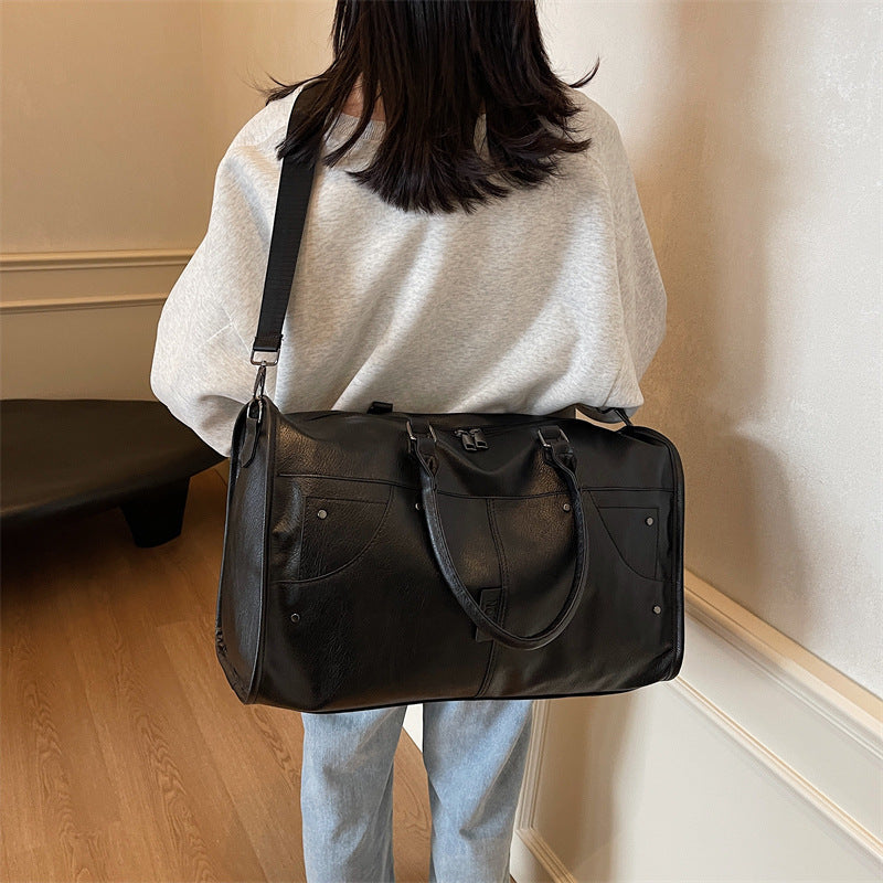 Elegant leather bag with stylish design and versatile carrying options Stornfield