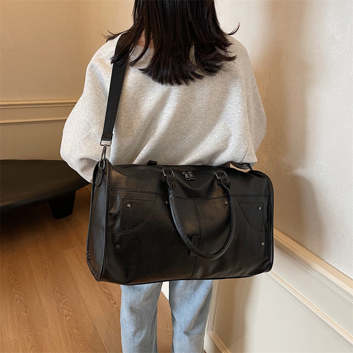 Elegant leather bag with stylish design and versatile carrying options Stornfield