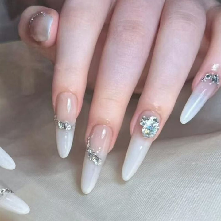 Glamorous artificial nail tips with elegant decorations Stornfield