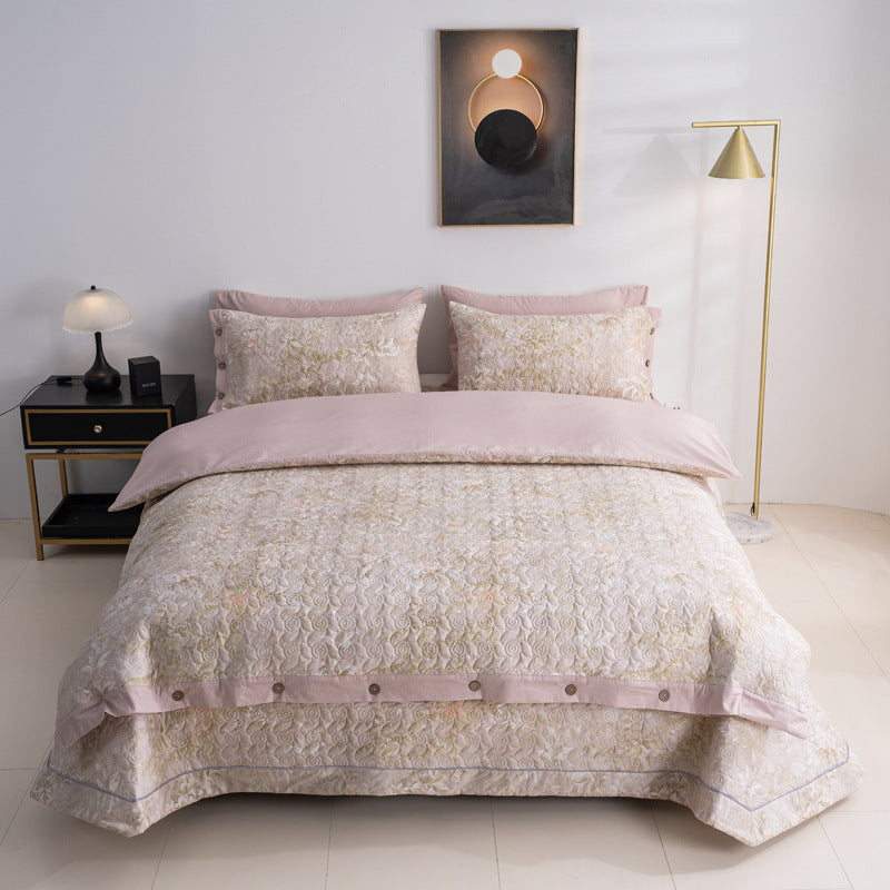 Quilted bedspread and bedding set with floral print, reversible function and decorative button placket