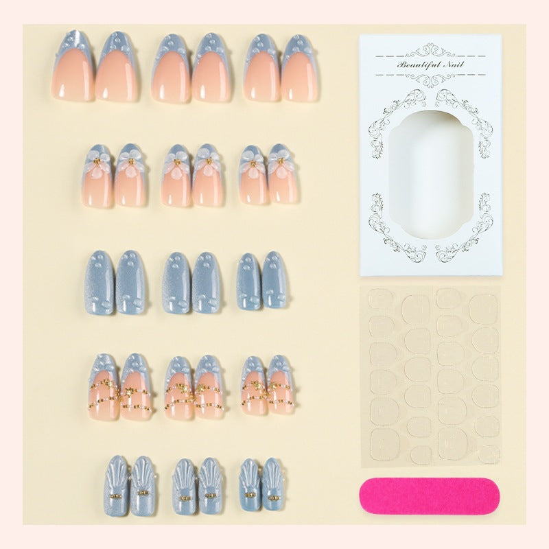 Artificial nail set with elegant flowers and glitter accents Stornfield