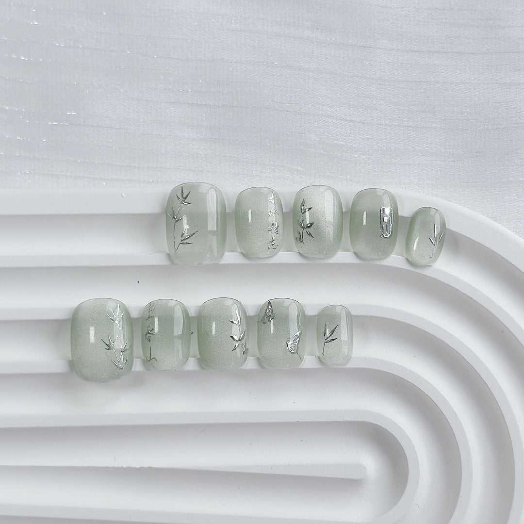 Artistic Press-On Nail Art Set with Heart and Celestial Designs