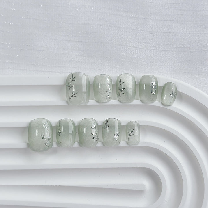 Artistic Press-On Nail Art Set with Heart and Celestial Designs