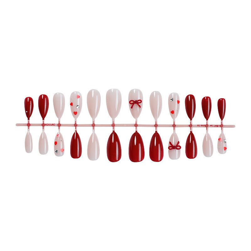 Artificial nail set with romantic designs and exquisite details Stornfield