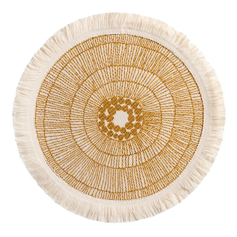 Round woven Boho rug mat with decorative fringes Stornfield