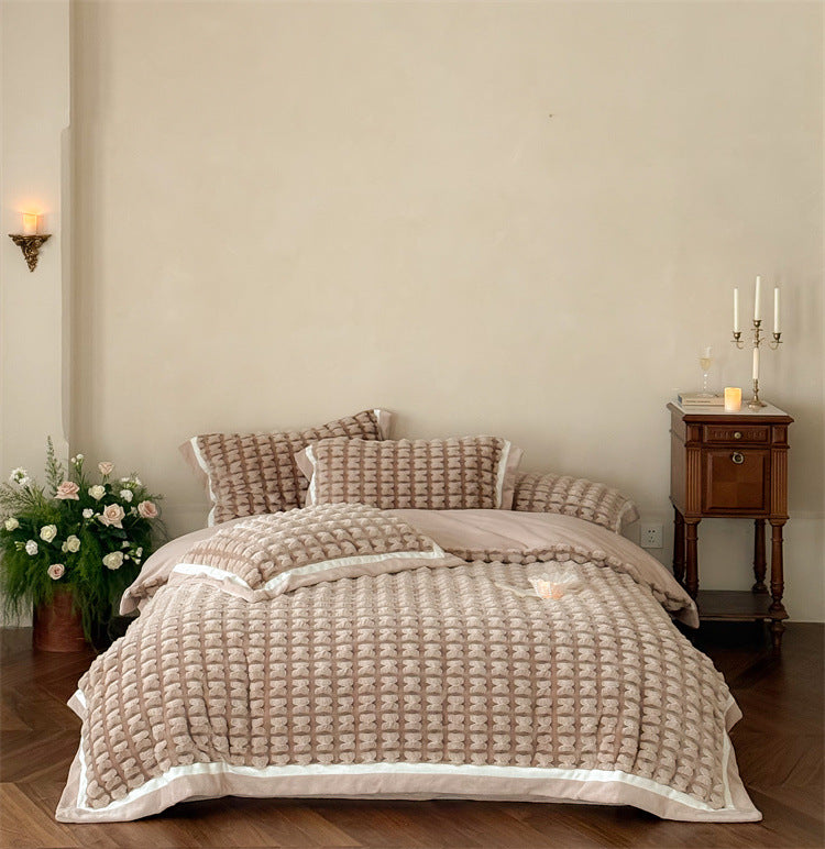 Quilted velvet bedding set with 3D waffle structure and decorative border Stornfield
