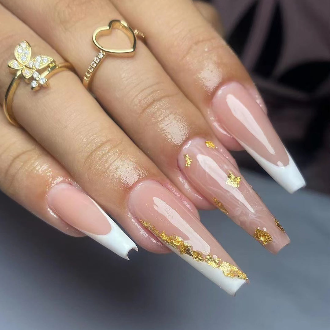 Artistic Stiletto Nails with Glitter and Shine Accents Stornfield