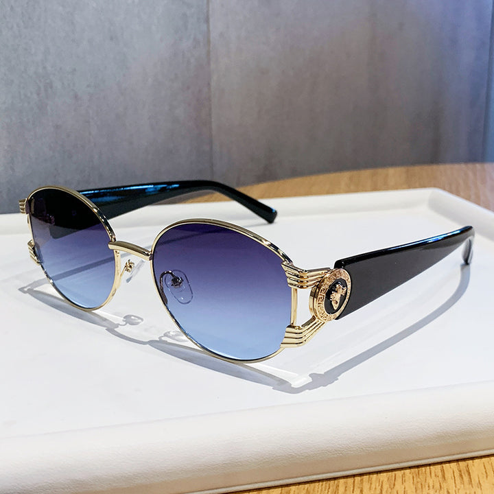 Ladies elegant sunglasses with luxurious metal frame and mirrored lenses Stornfield