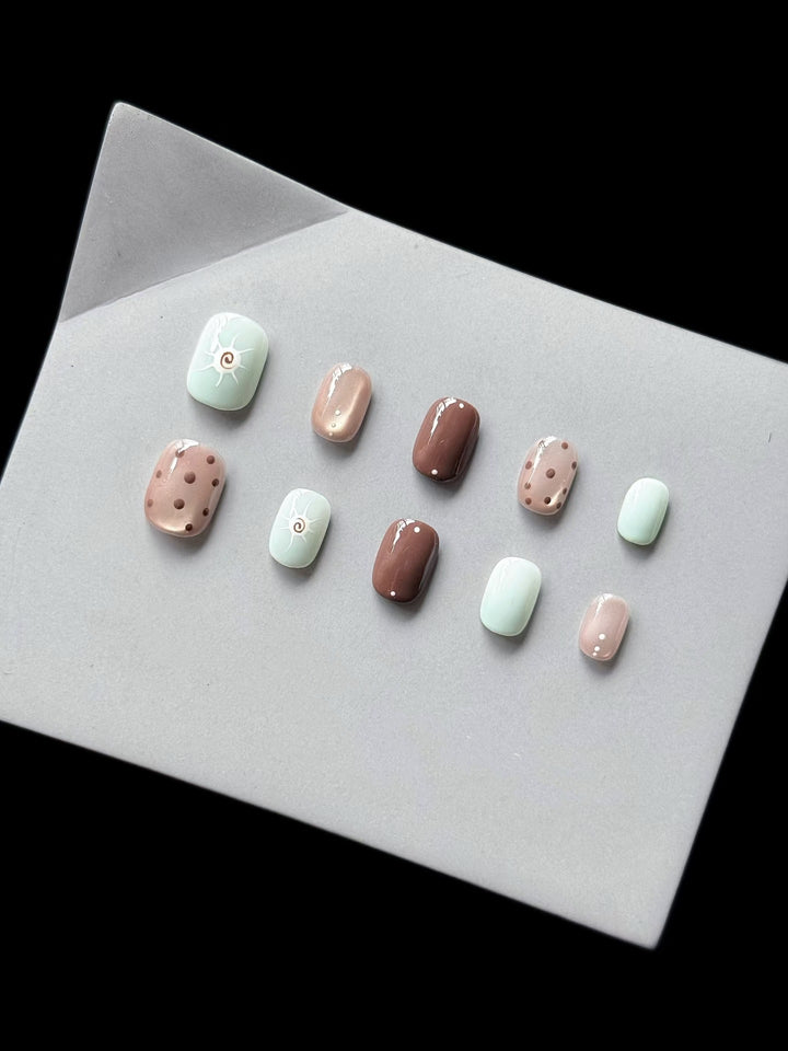 Decorative Press-On Nail Set with Unique Artistic Designs