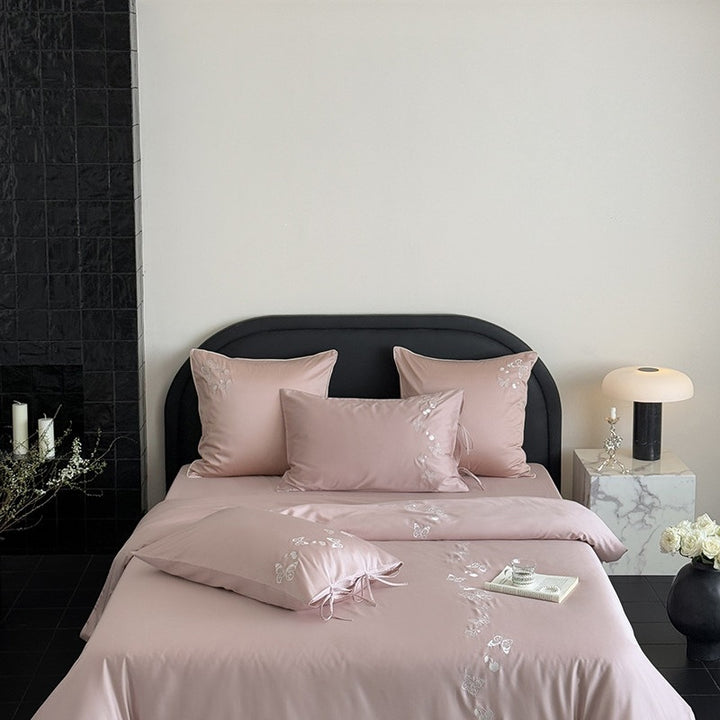 Luxurious cotton satin bedding set with butterfly embroidery and tie band pillow