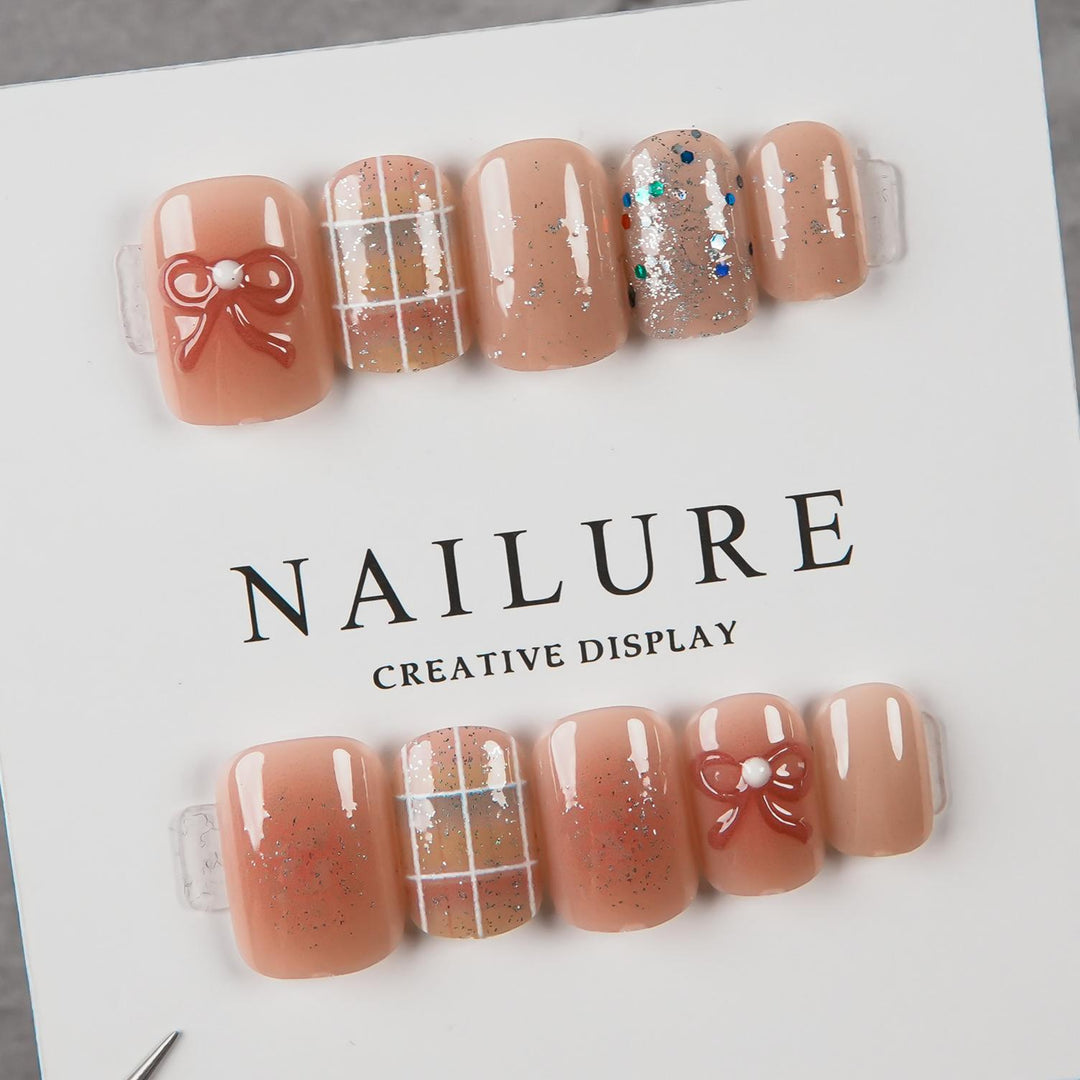 Artistic Press-On Nail Set with Decorative Bow Accents