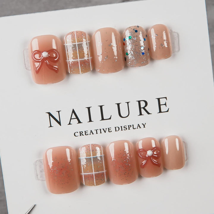Artistic Press-On Nail Set with Decorative Bow Accents