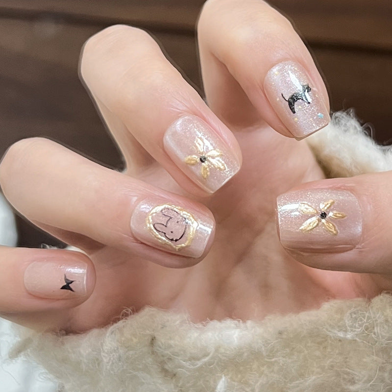 Decorative Press-On Nail Set with Star and Bow Designs Stornfield