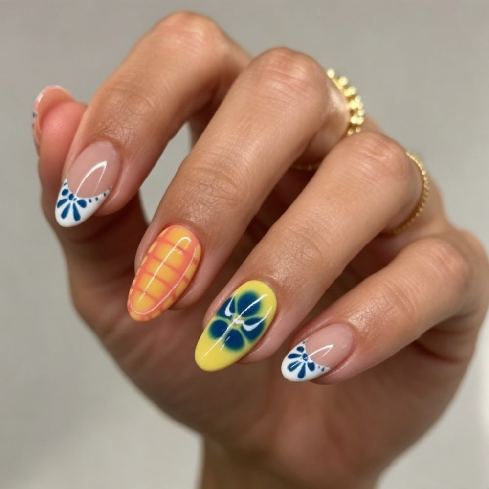 Artificial nails with colorful floral accents Stornfield