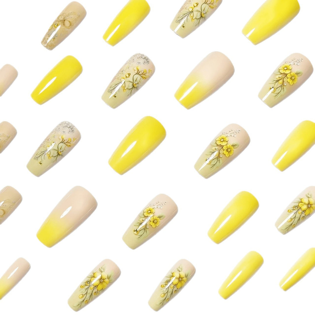 Artificial nails with floral embellishments and glitter Stornfield