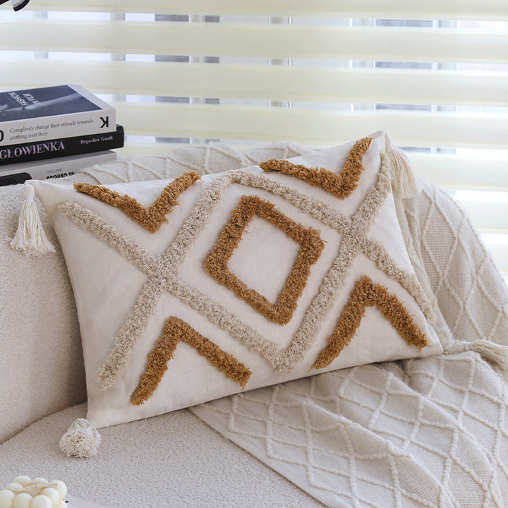 Square cushion cover made of cotton-linen with raised diamond tufting and corner tassels Stornfield