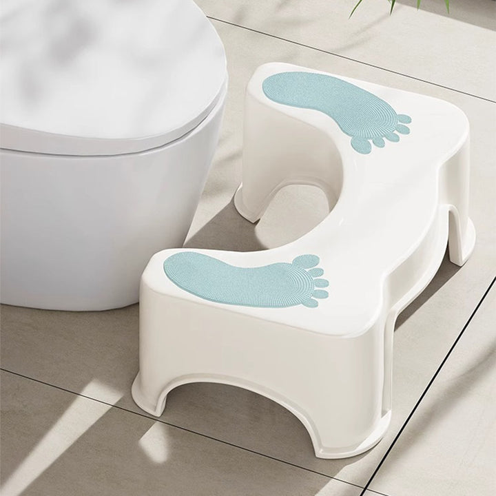 Ergonomic Toilet Footstool with Anti-Slip Pads and Curved Squat Posture Design