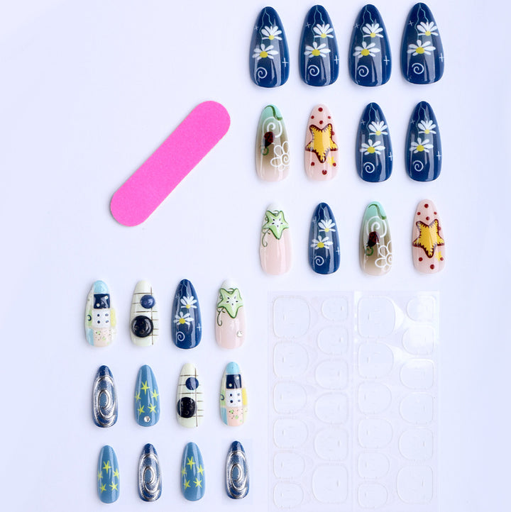 Artificial nails with creative maritime designs and 3D elements Stornfield