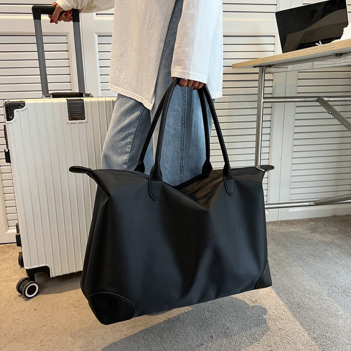 Large travel bag with durable material and multiple compartments Stornfield