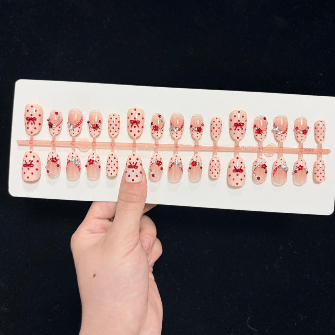 Decorative Press-On Nail Set with Star and Bow Designs Stornfield